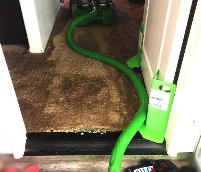 Water Damage Job, Drying Carpet, Dehumidifier equipment Servpro