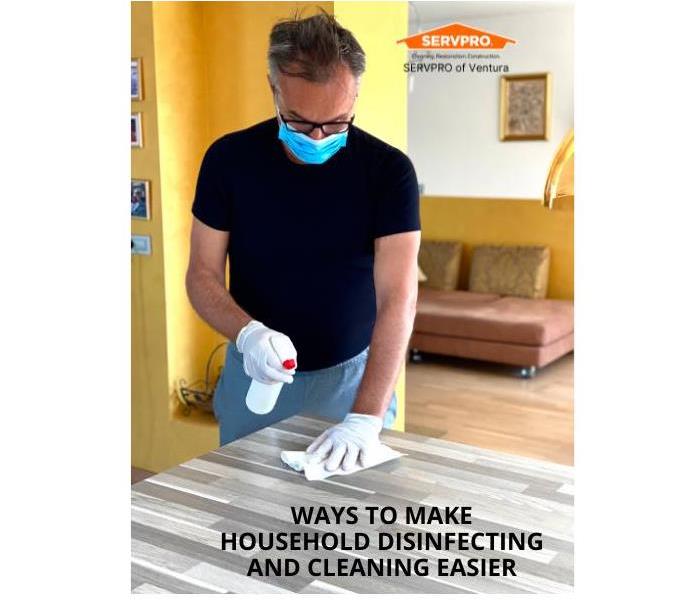 man disinfecting home interior